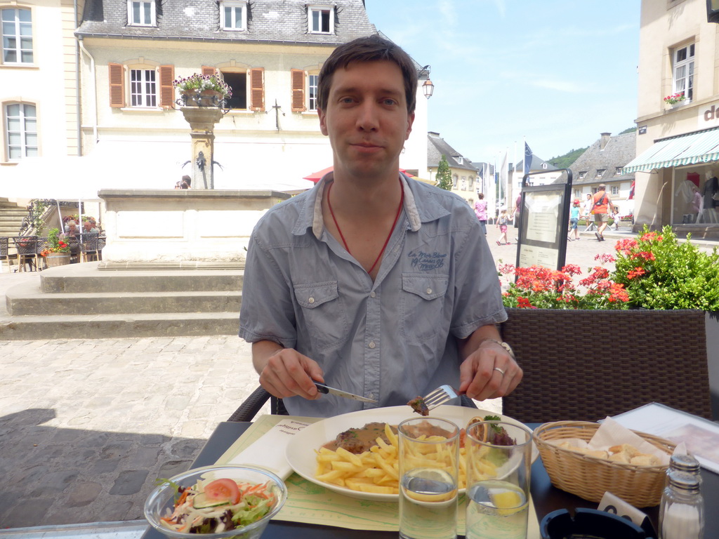 Tim having lunch at the De La Basilique restaurant at the northeast side of the Place du Marché square