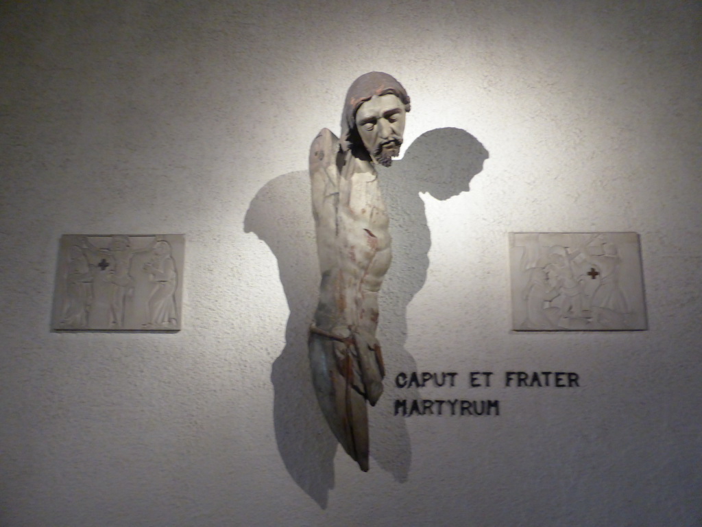 Statue and reliefs at the Basilica of St. Willibrord