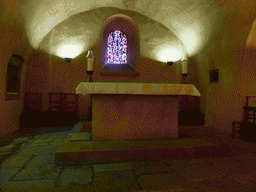 Altar and stained glass window in the crypt of the Basilica of St. Willibrord