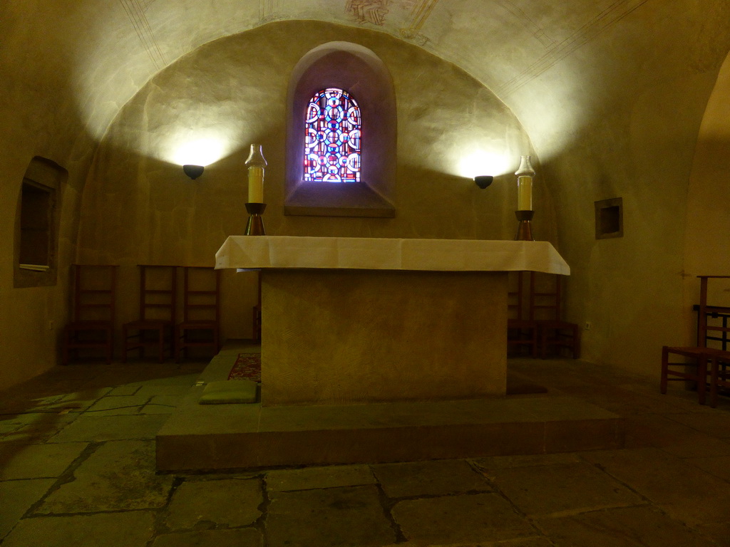 Altar and stained glass window in the crypt of the Basilica of St. Willibrord