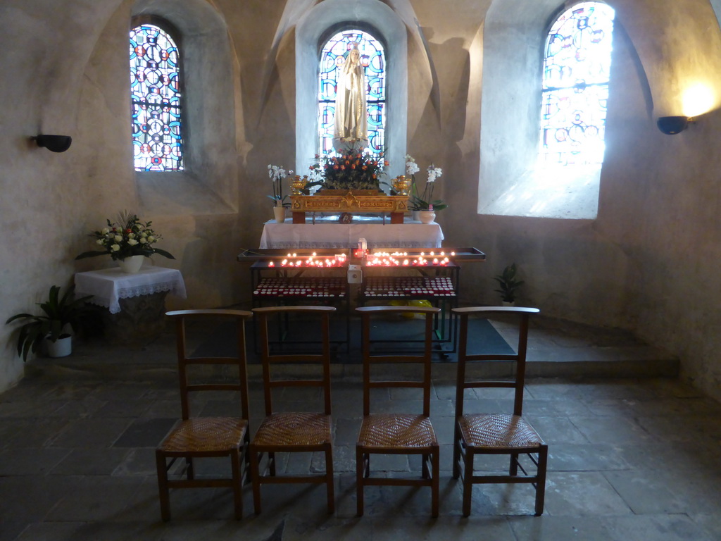 Altar and stained glass windows in the crypt of the Basilica of St. Willibrord