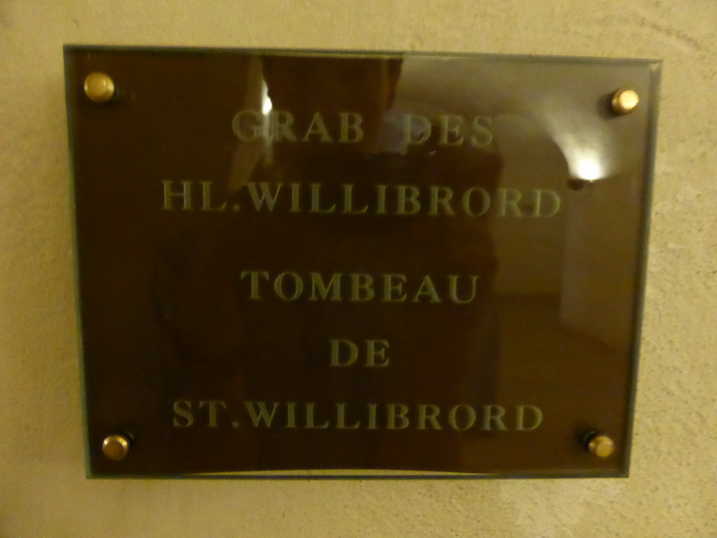 Explanation on the Tomb of St. Willibrord in the crypt of the Basilica of St. Willibrord