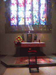 Side altar and stained glass window at the Basilica of St. Willibrord