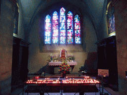 Side altar and stained glass window at the Basilica of St. Willibrord