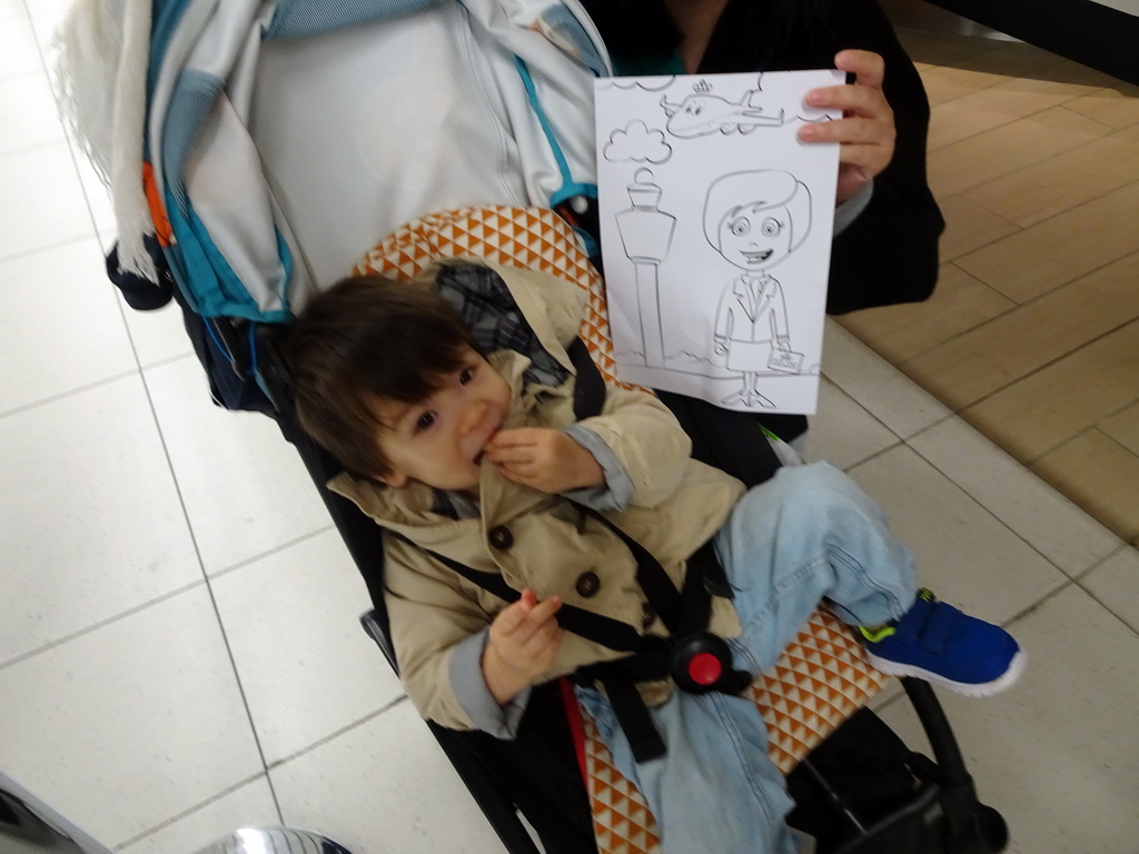 Max with KLM coloring page at the Departures Hall of Schiphol Airport