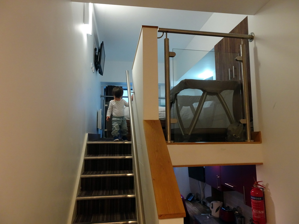 Max at the staircase in our first apartment at Richmond Place Apartments