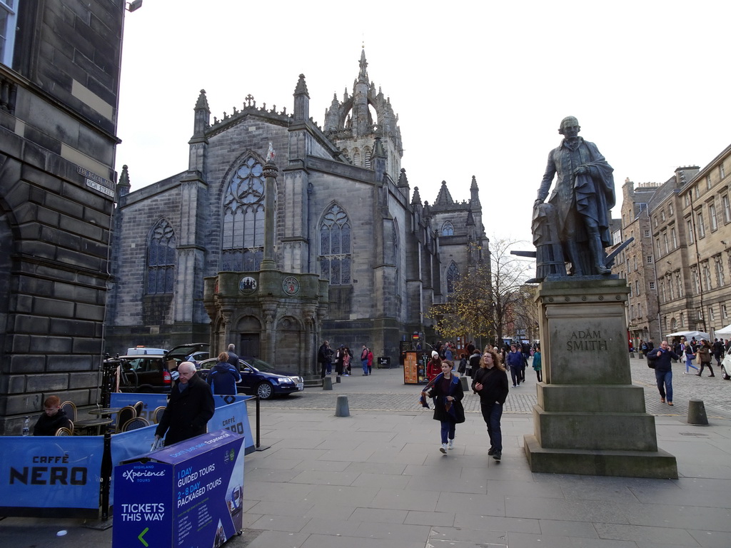 Statue of Adam Smith, the Mercat Cross and the east side of St. Giles` Cathedral at Parliament Square