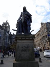 Statue of Adam Smith and the east side of St. Giles` Cathedral at Parliament Square