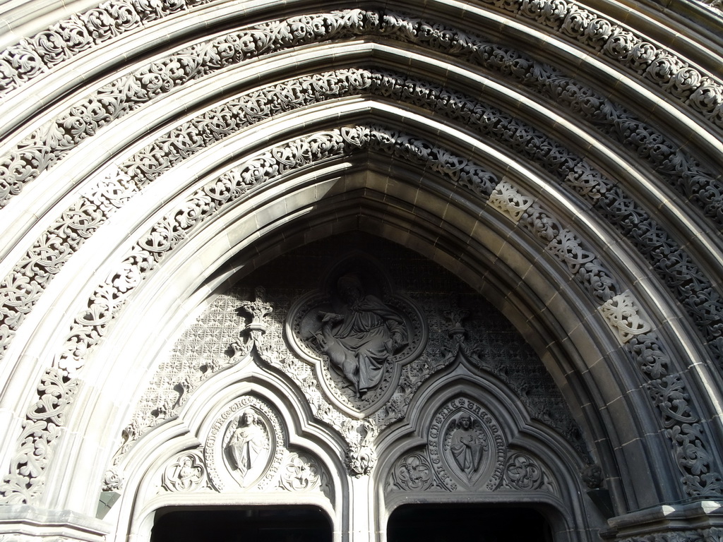 Reliefs at the entrance gate at the west side of St. Giles` Cathedral at West Parliament Square