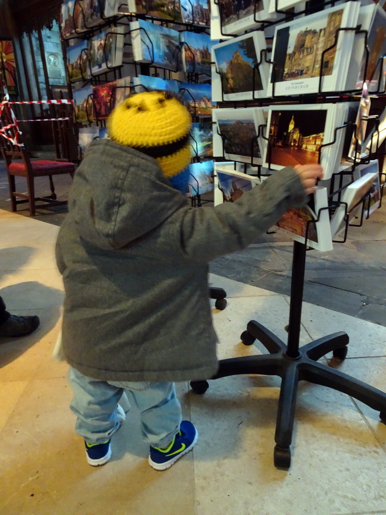 Max with postcards in front of the cathedral shop at St. Giles` Cathedral