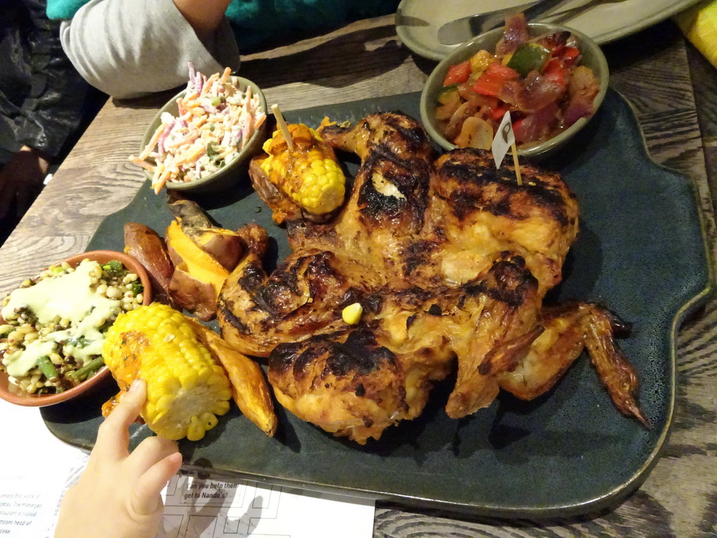 Chicken, corn and salad at the Nando`s Edinburgh Chambers Street restaurant