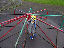Max on the roundabout at the playground at Dumbiedykes Road