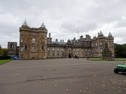 Forecourt with fountain and the front of the Palace of Holyroodhouse, viewed from the Main Gate at Abbey Strand