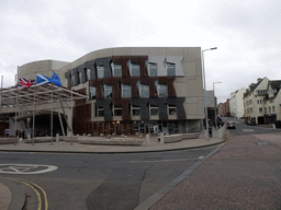 Right front of the Scottish Parliament Building at the crossing of the Horse Wynd and the Royal Mile