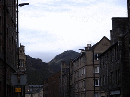 Buildings at the East Crosscauseway and Holyrood Park with Arthur`s Seat, at sunset