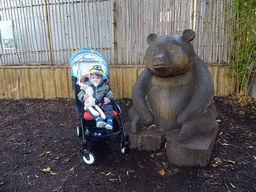 Max with a statue of a Giant Panda at the Giant Panda Exhibit at the Edinburgh Zoo