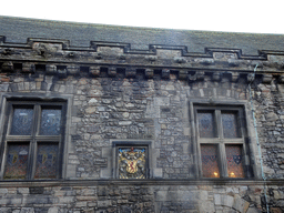 Stained glass windows and relief an the front of the Great Hall at Edinburgh Castle