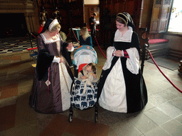 Max with women in traditional clothing in the Great Hall at Edinburgh Castle