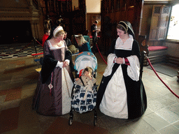 Max with women in traditional clothing in the Great Hall at Edinburgh Castle