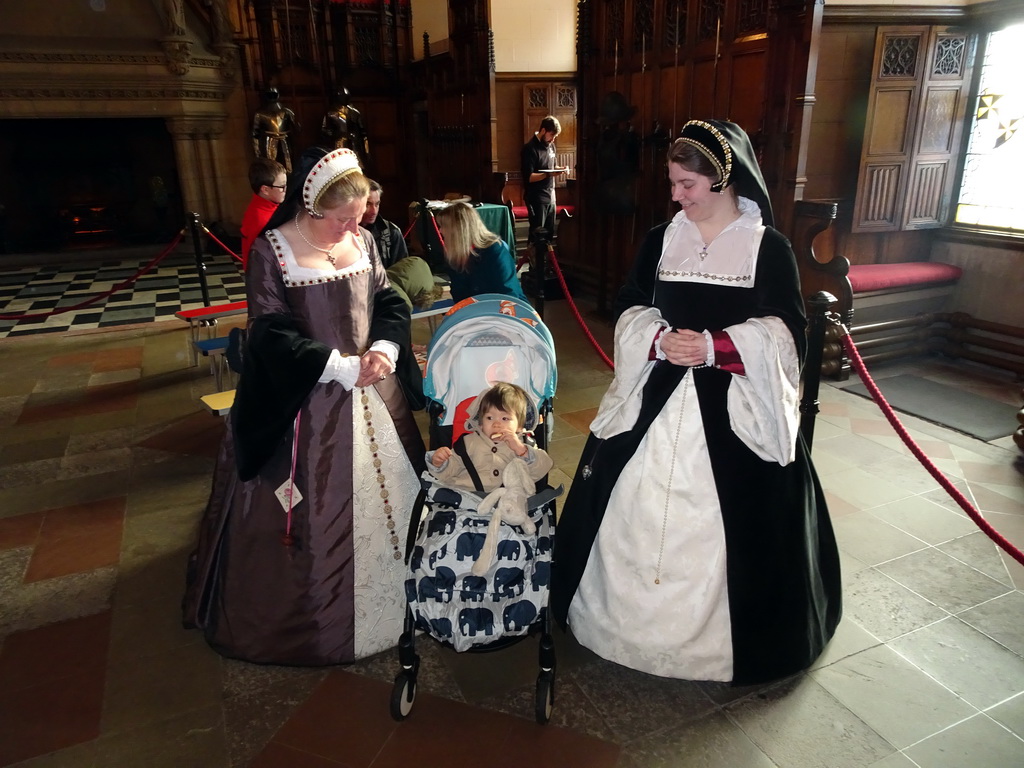 Max with women in traditional clothing in the Great Hall at Edinburgh Castle