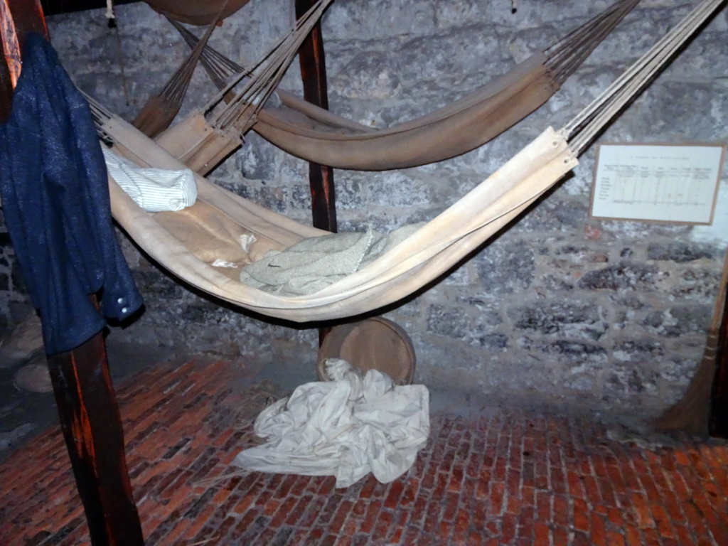 Hammocks in a prison cell at the Prisons of War Exhibition building at Edinburgh Castle