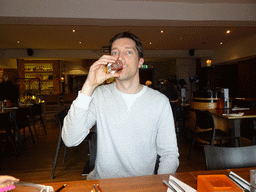 Tim drinking whiskey at the Amber Restaurant at the Scotch Whisky Experience