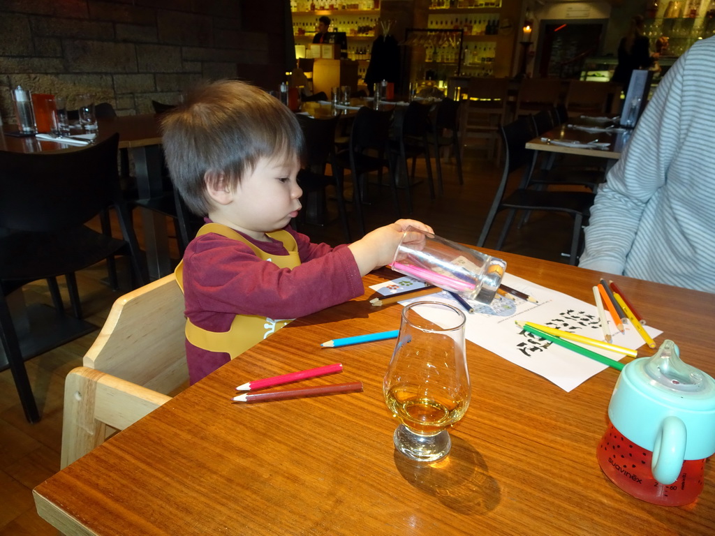 Max playing with pencils at the Amber Restaurant at the Scotch Whisky Experience