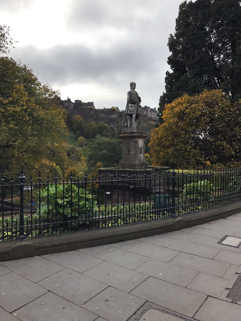 Statue of Allan Ramsay, the Princes Street Gardens and Edinburgh Castle, viewed from the Princes Street