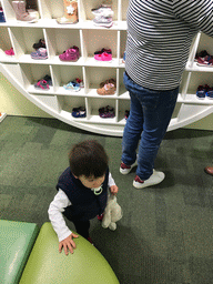 Max in a shoe store at Princes Street