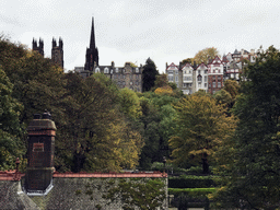 The Princes Street Gardens with the Greenskeeper`s Cottage, the Hub and the New College, viewed from the staircase at the northeast side of the Princes Street Gardens