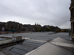 The Edinburgh Waverley railway station, the Old Town with the Hub and the Lloyds Banking Group Head Office, and Edinburgh Castle, viewed from North Bridge