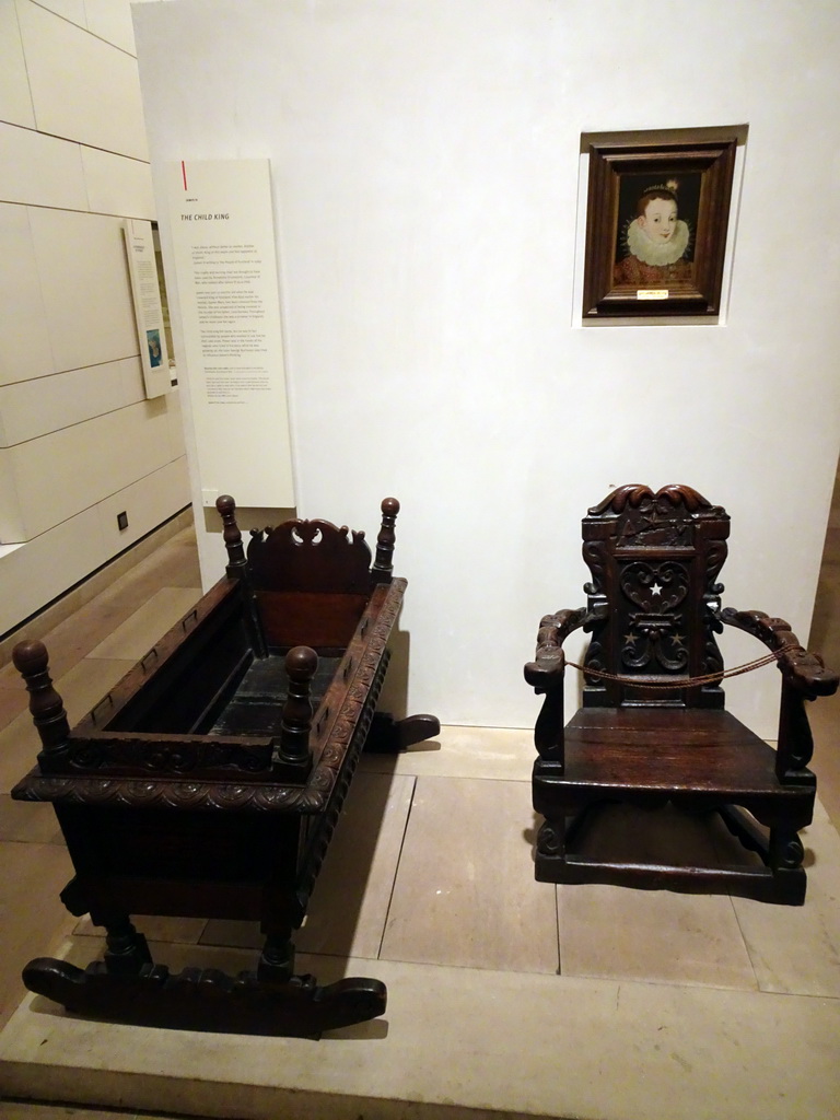 Cradle, chair and portrait of the `Child King` James VI, at the Kingdom of the Scots Hall at the First Floor of the National Museum of Scotland, with explanation