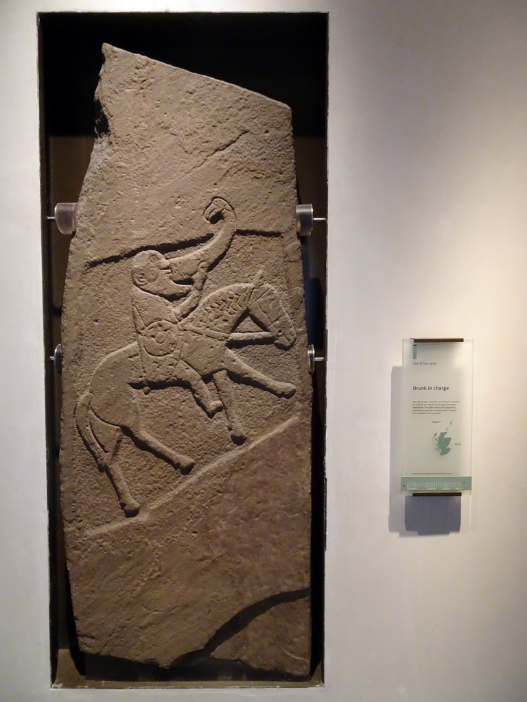 Relief `Drunk in Charge` at the Early People Hall at the Basement of the National Museum of Scotland, with explanation