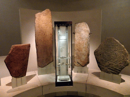 Stones with prehistoric carvings, at the Early People Hall at the Basement of the National Museum of Scotland, with explanation
