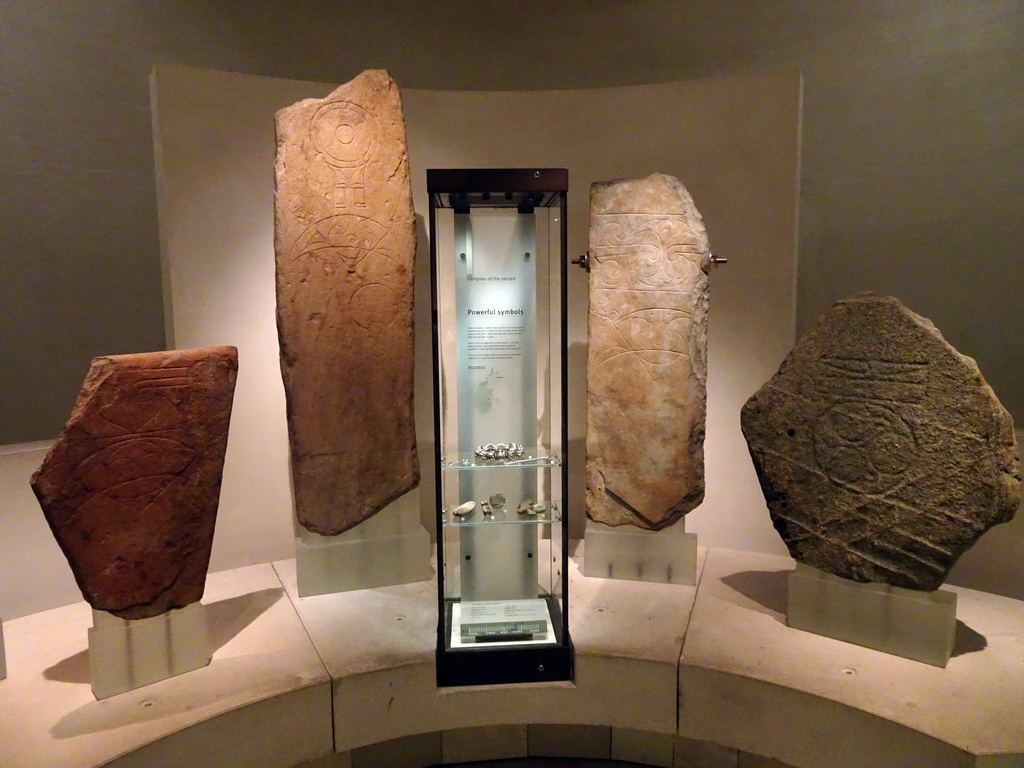 Stones with prehistoric carvings, at the Early People Hall at the Basement of the National Museum of Scotland, with explanation