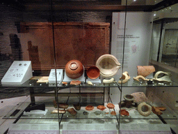 Relief, vases and other items from Roman times, at the Early People Hall at the Basement of the National Museum of Scotland, with explanation