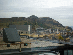 Holyrood Park with the Salisbury Crags and Arthur`s Seat, viewed from the Roof Terrace Garden on the Seventh Floor of the National Museum of Scotland