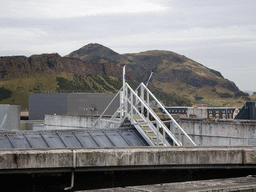 Holyrood Park with the Salisbury Crags and Arthur`s Seat, viewed from the Roof Terrace Garden on the Seventh Floor of the National Museum of Scotland