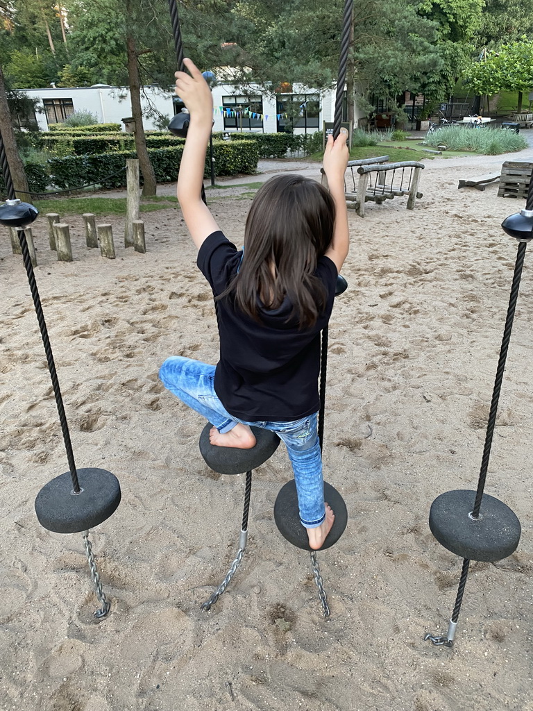 Max on a rope bridge at the main playground at the Landal Coldenhove holiday park