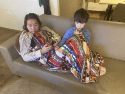 Miaomiao and Max playing on the Nintendo Switch in the living room of our holiday home at the Landal Coldenhove holiday park
