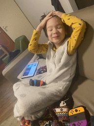 Max playing on the Nintendo Switch and the iPad in the living room of our holiday home at the Landal Coldenhove holiday park