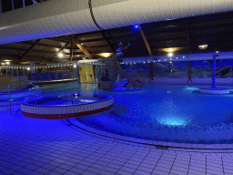 Interior of the swimming pool at the Landal Coldenhove holiday park, by night