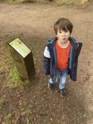 Max with a sign about butterflies at the Landal Coldenhove holiday park