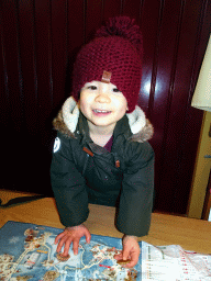 Max with the map of the Winter Efteling at the `t Poffertje restaurant at the Anton Pieck Plein square at the Marerijk kingdom