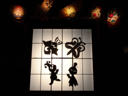 Shadow play at the Chinese scene at the Carnaval Festival attraction at the Reizenrijk kingdom, during the Winter Efteling