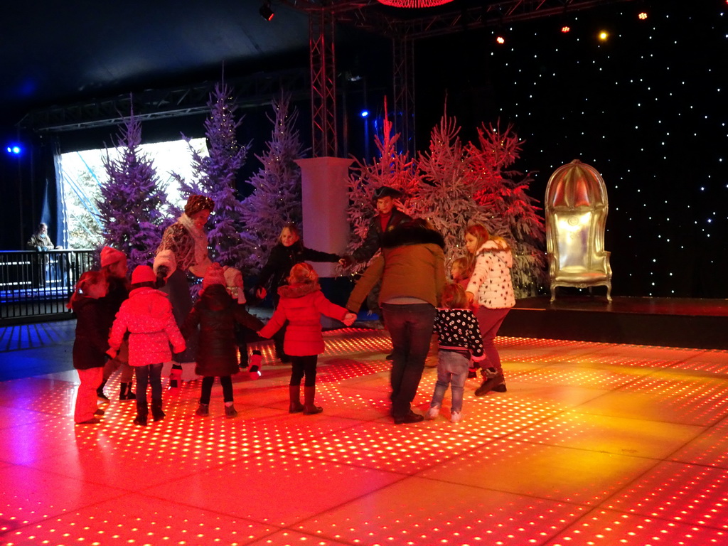 Actors and visitors during the `Fire Prince and Snow Princess` show at the IJspaleis attraction at the Reizenrijk kingdom, during the Winter Efteling