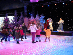 Actors and visitors during the `Fire Prince and Snow Princess` show at the IJspaleis attraction at the Reizenrijk kingdom, during the Winter Efteling