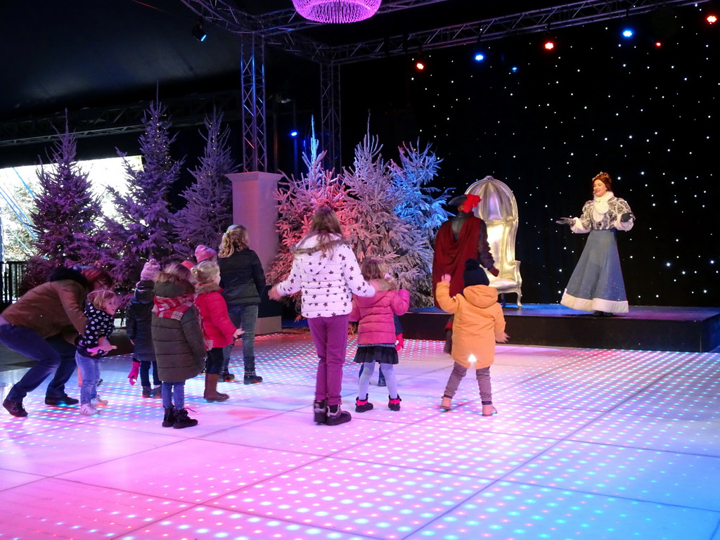 Actors and visitors during the `Fire Prince and Snow Princess` show at the IJspaleis attraction at the Reizenrijk kingdom, during the Winter Efteling