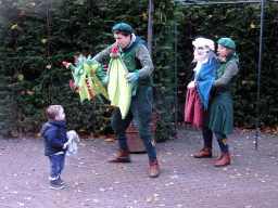 Actors with hand puppets during the Sprookjesboom Show at the Open-air Theatre at the Fairytale Forest at the Marerijk kingdom, during the Winter Efteling