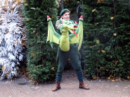 Actor with hand puppet during the Sprookjesboom Show at the Open-air Theatre at the Fairytale Forest at the Marerijk kingdom, during the Winter Efteling